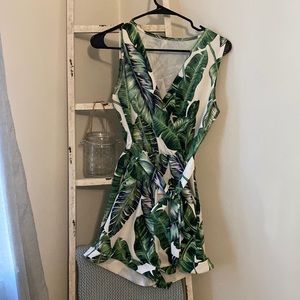 White romper with palm leaves